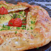 Galette de queso brie y tomate con hierbas provenzales