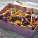 Patata violeta con angula de monte y piñones