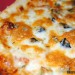 Pizza de jamón ibérico, berenjena y queso de cabra