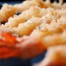 Langostinos en tempura con romescu de cacahuetes